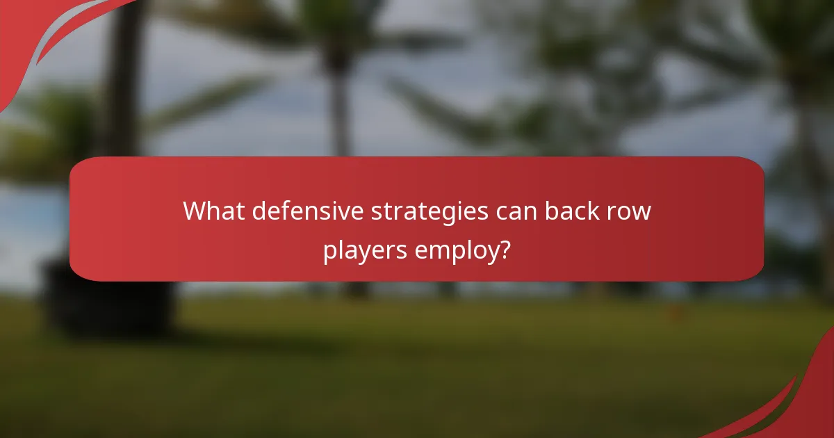 What defensive strategies can back row players employ?